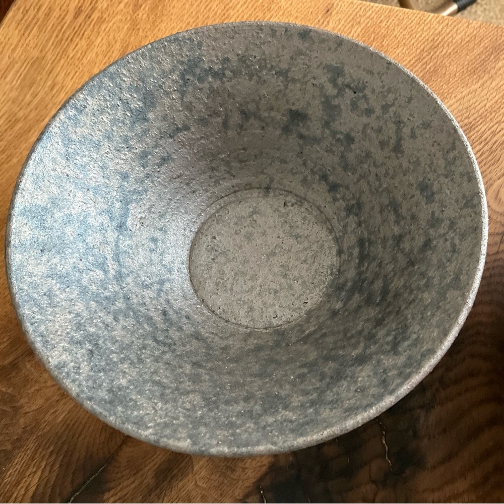 Two handmade Japanese pottery bowls, silver and black, lunar, wabi-sabi